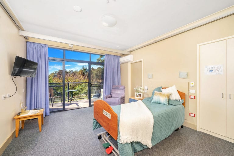 Tura-Beach-Hugh-Cunningham-Gardens-bedroom-dressed-768x512 | RSL LifeCare - provide care and service to war veterans, retirement villages and accommodation, aged care services and assisted living