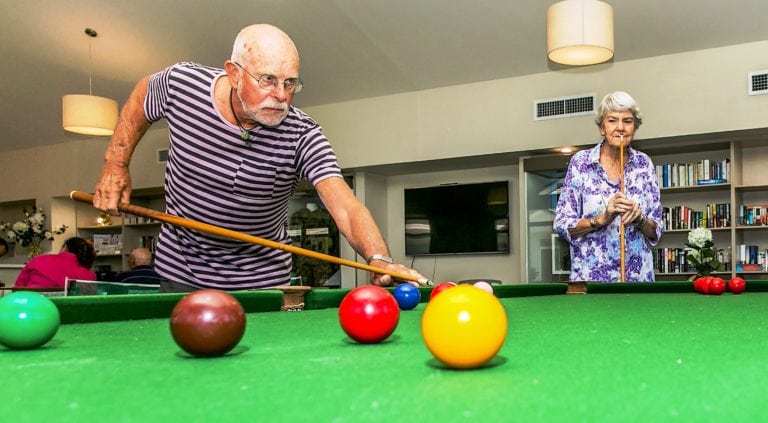 Bayside-residents-playing-pool-768x423 | RSL LifeCare - provide care and service to war veterans, retirement villages and accommodation, aged care services and assisted living