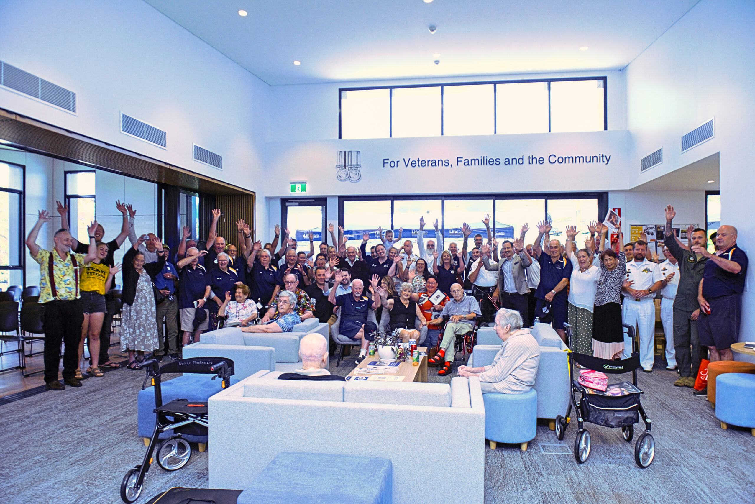 A_Nowra-1yr-Group-Shot-hand-up-editedCC-scaled | RSL LifeCare - provide care and service to war veterans, retirement villages and accommodation, aged care services and assisted living